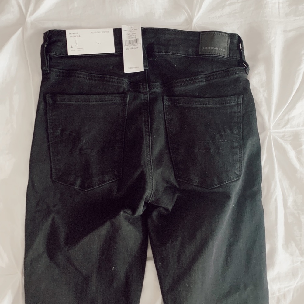 Never worn black American Eagle skinny jeans